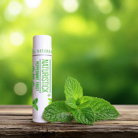 Naturistick tubes in a purse travel scene showing on-the-go lip care readiness