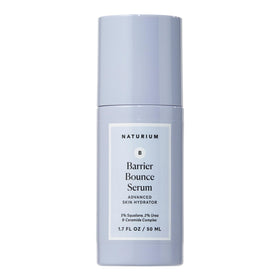 Naturium bottle front packaging showing serum and benefits