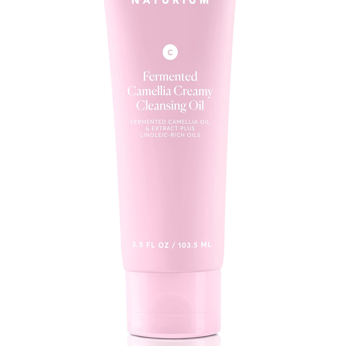 Naturium on bathroom vanity with towel showing everyday skincare routine benefit