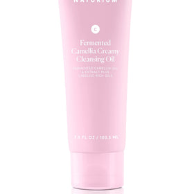 Naturium on bathroom vanity with towel showing everyday skincare routine benefit