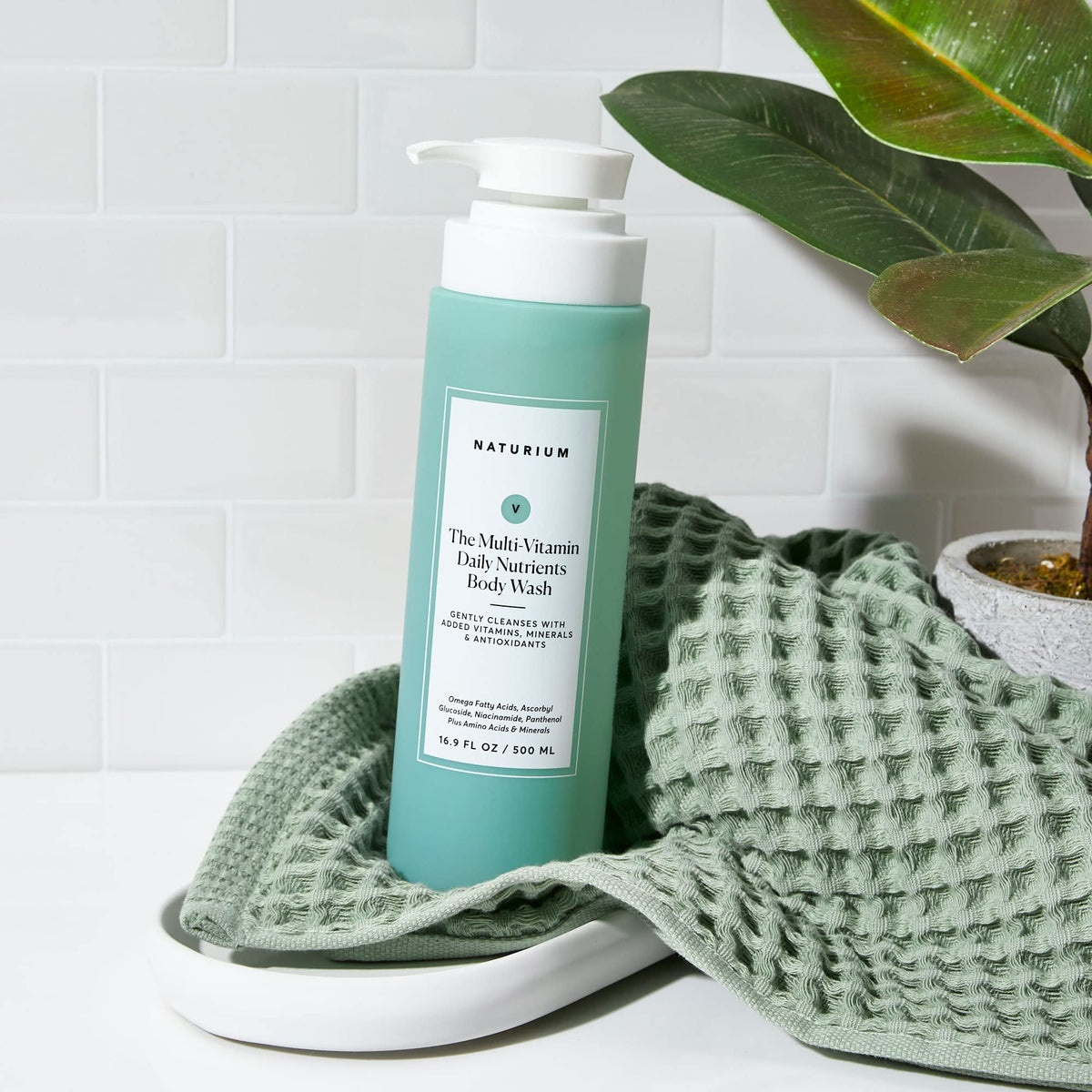 Naturium ingredients and icons highlighting vegan and paraben-free