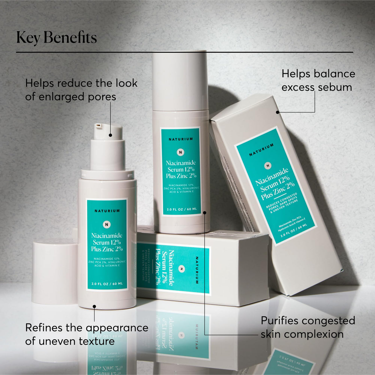 Naturium serum on fingertips demonstrating easy layering and quick absorbency