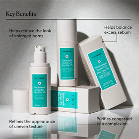 Naturium serum on fingertips demonstrating easy layering and quick absorbency