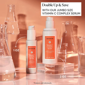 Naturium serum drop on fingertip showing lightweight texture and hydration