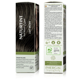 Naturtint 1.52 fl oz tube held in hand showing compact travel-ready size