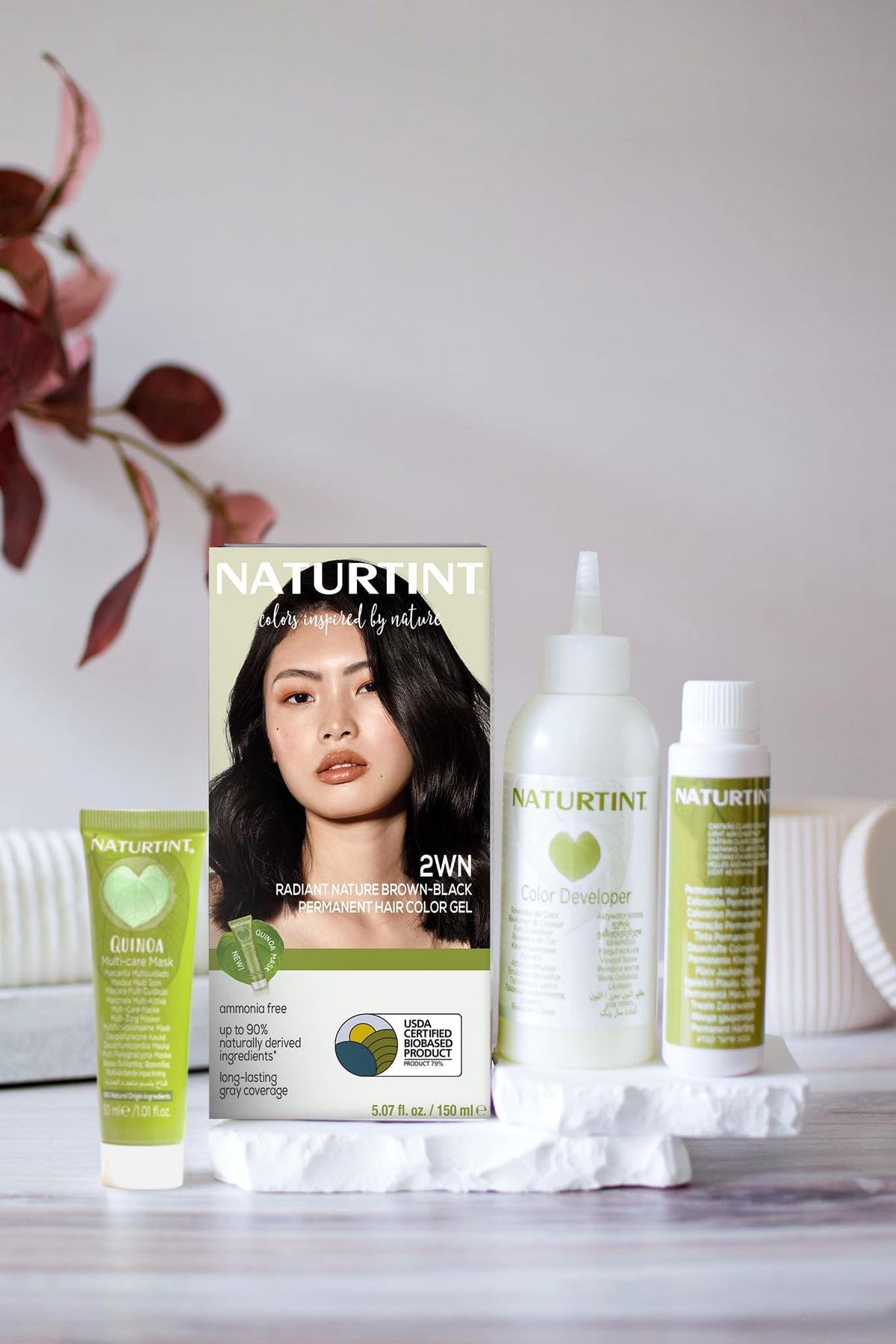 Naturtint tube and developer bottle displayed for easy at-home application