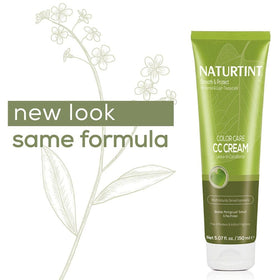 Naturtint bottle beside hairbrush showing product size and portability