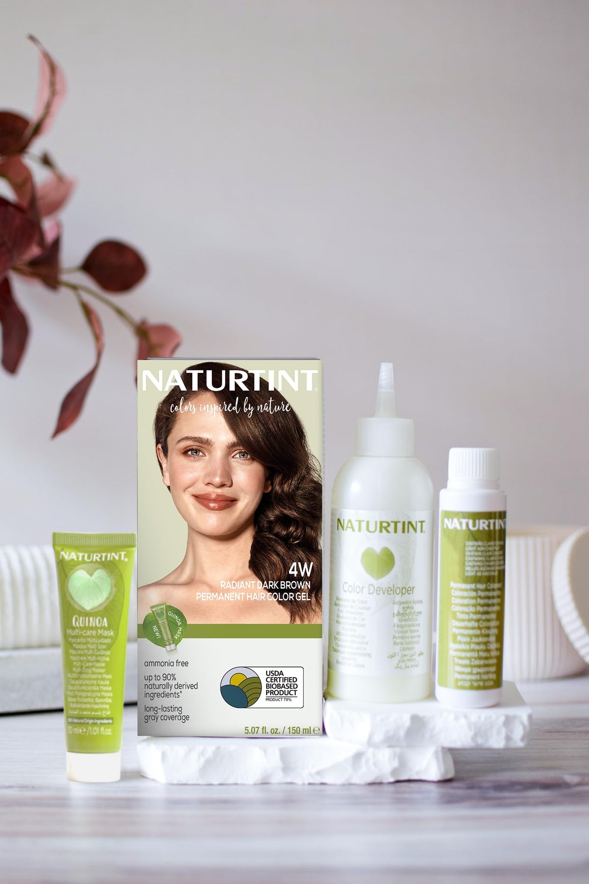 Naturtint colorant tube and developer bottle prepared for mess-free mixing