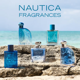 Bottle set on coastal rocks evoking Nautica Pure Blue ocean-inspired freshness