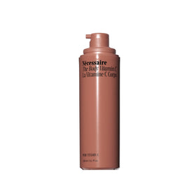 Nécessaire front bottle shot showing clean design and brightening promise