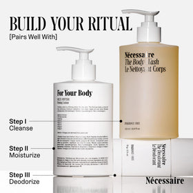 Nécessaire bottle paired with plant oils to show nourishing vitamin-rich sources