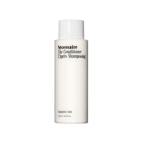 Nécessaire conditioner front packaging showing bottle and label, benefits visible