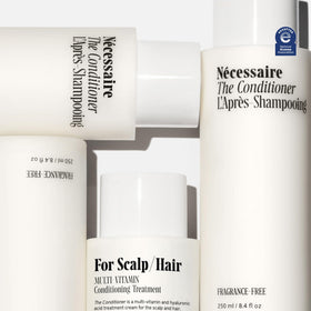 Nécessaire conditioner texture close-up showing creamy, hydrating consistency