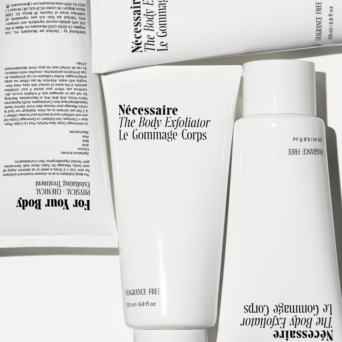 Nécessaire pump dispensing exfoliator demonstrating easy in-shower use