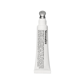 Nécessaire front tube view showing clean minimalist packaging and benefit of skincare-grade balm