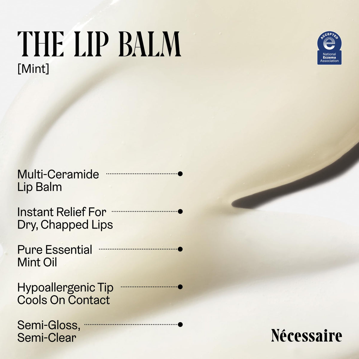 Nécessaire open-tip close-up revealing smooth balm texture and quick glide benefit