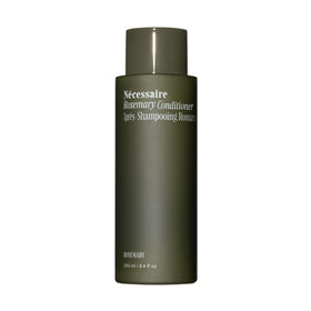 Nécessaire front bottle view showing minimalist packaging and cleanser benefit