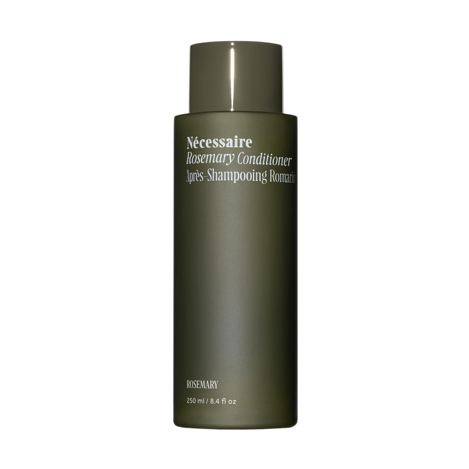 Nécessaire front bottle view showing minimalist packaging and cleanser benefit