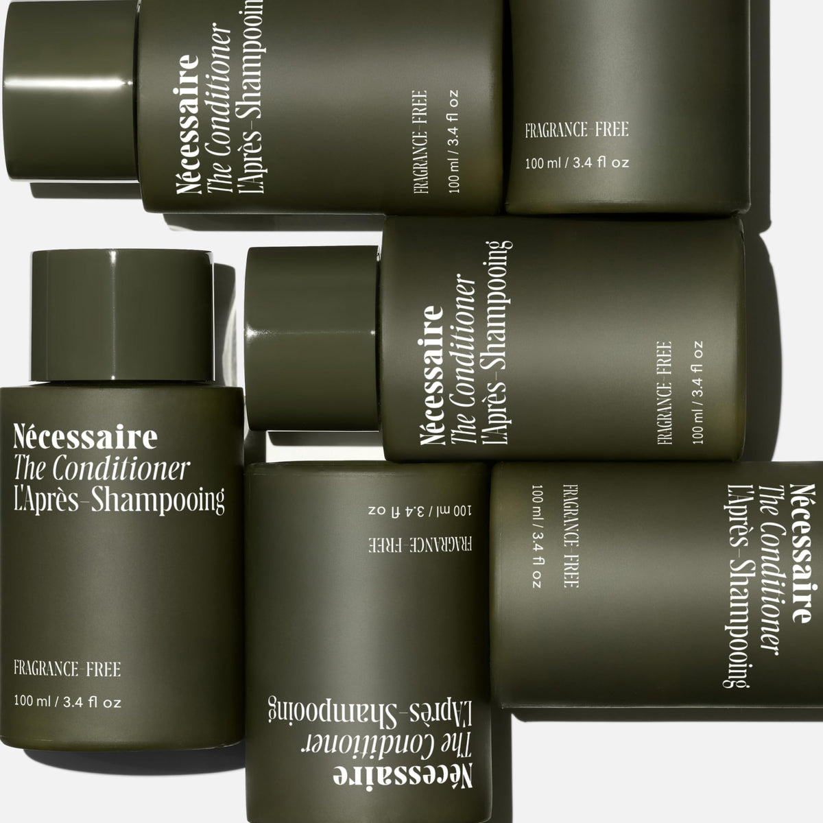 Nécessaire gel-cream texture on hand showing lightweight conditioning slip