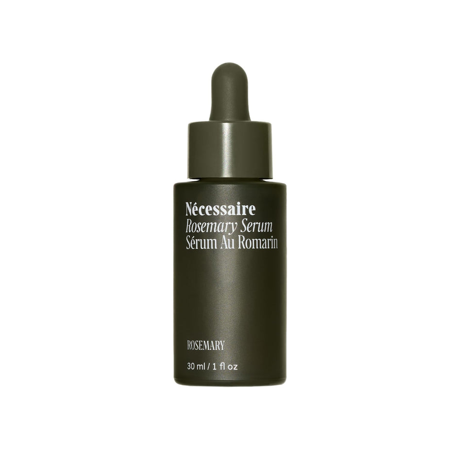 Nécessaire bottle front view showing compact 30ml serum packaging and quick-dry benefit