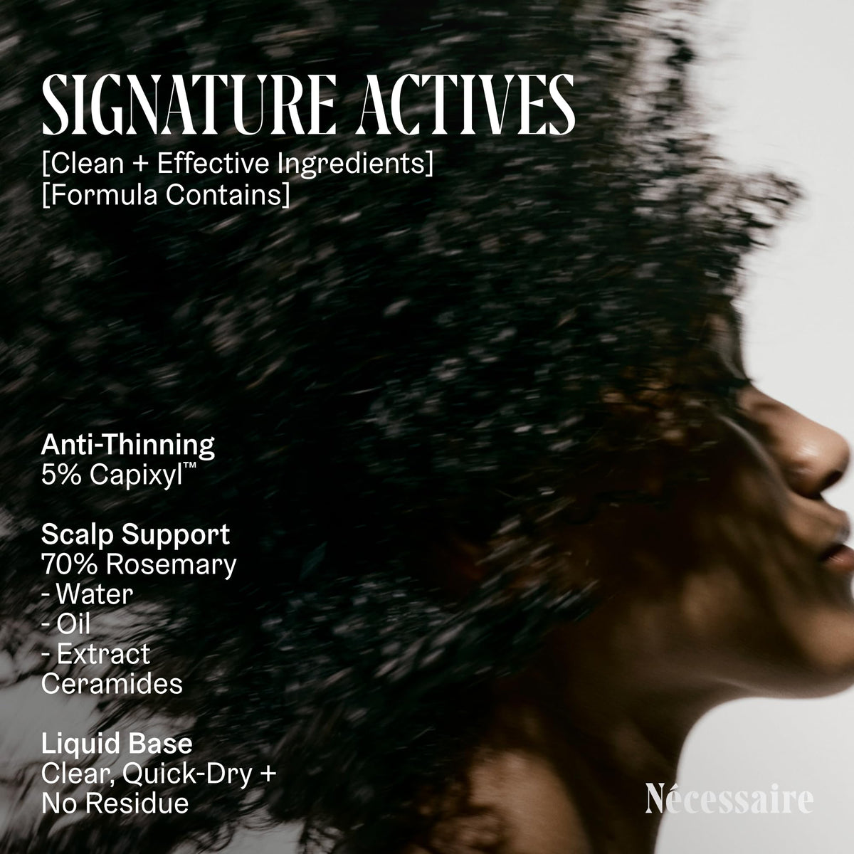 Applying Nécessaire serum to scalp with fingertips demonstrating targeted daily use