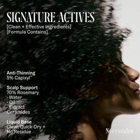 Applying Nécessaire serum to scalp with fingertips demonstrating targeted daily use