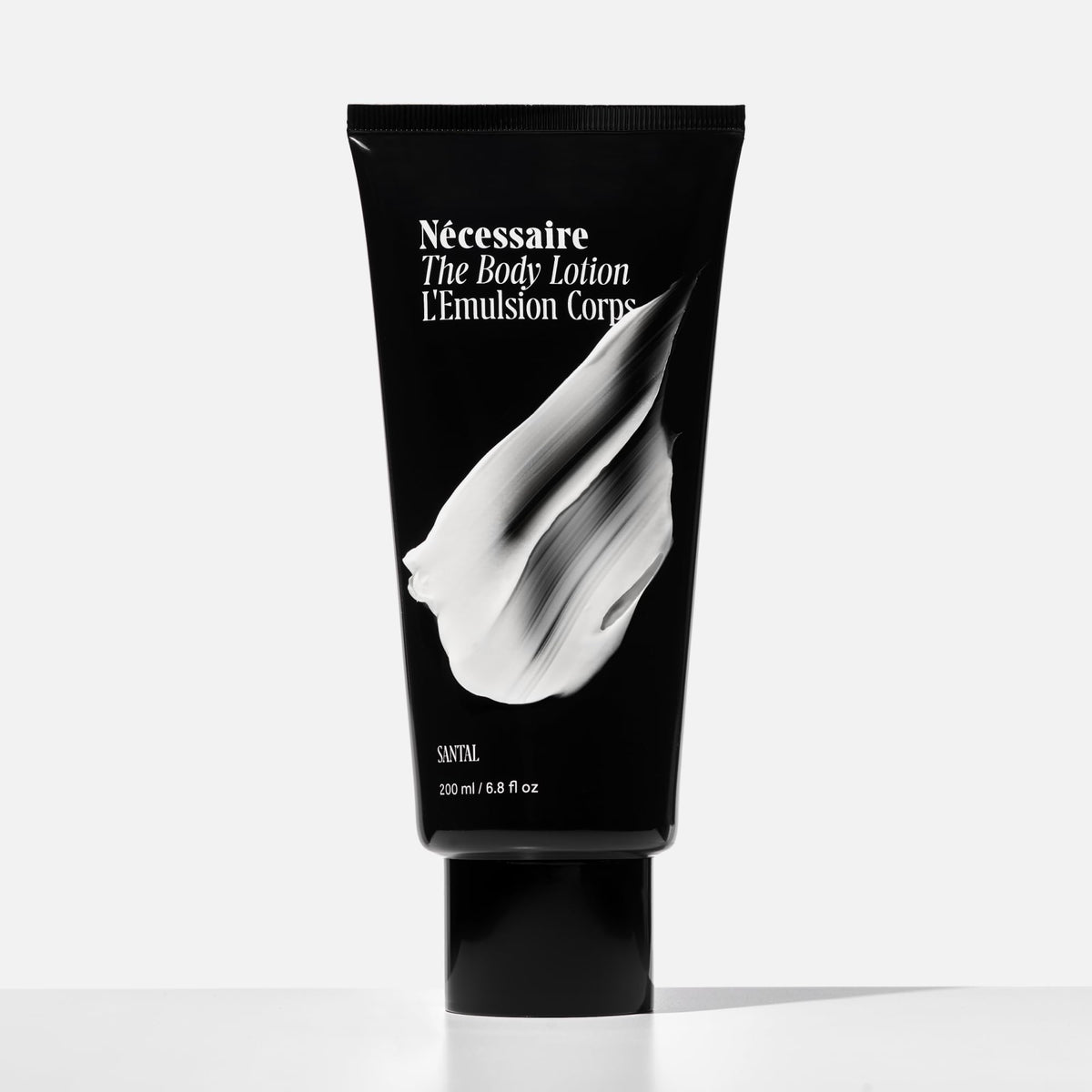 Nécessaire lotion texture swatch showing lightweight absorbent finish