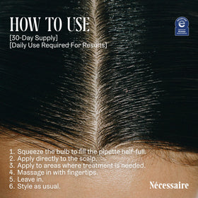Nécessaire scalp serum droplet on fingertip showing lightweight, fast-absorbing texture for comfortable wear