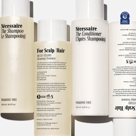 Nécessaire shampoo bottle pump close-up highlighting easy dispensing