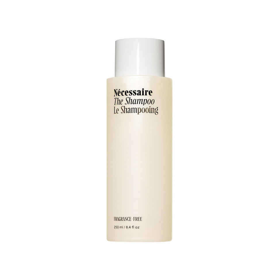 Nécessaire front bottle shot showing minimalist design and clear product benefits