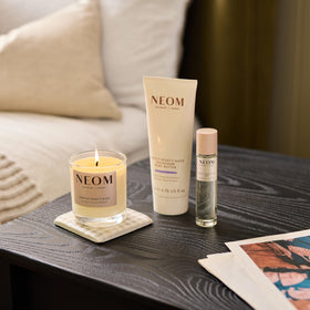 Neom packaging label close-up showing natural essential oil blend details