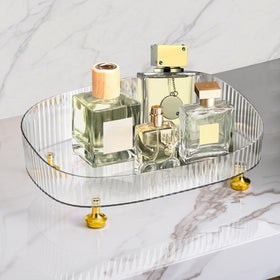 neotidy clear tray front view showing organized bottles and tidy display benefit