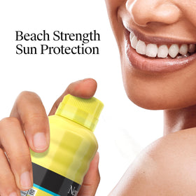 Neutrogena being sprayed into hands for safe facial application and coverage