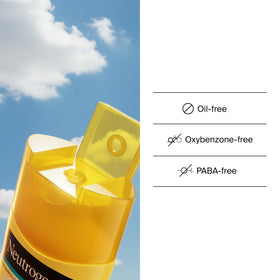 Neutrogena bottle on towel demonstrating travel-ready beach convenience