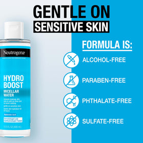 Neutrogena bottle beside a ruler showing 13.5 fl oz size for travel convenience