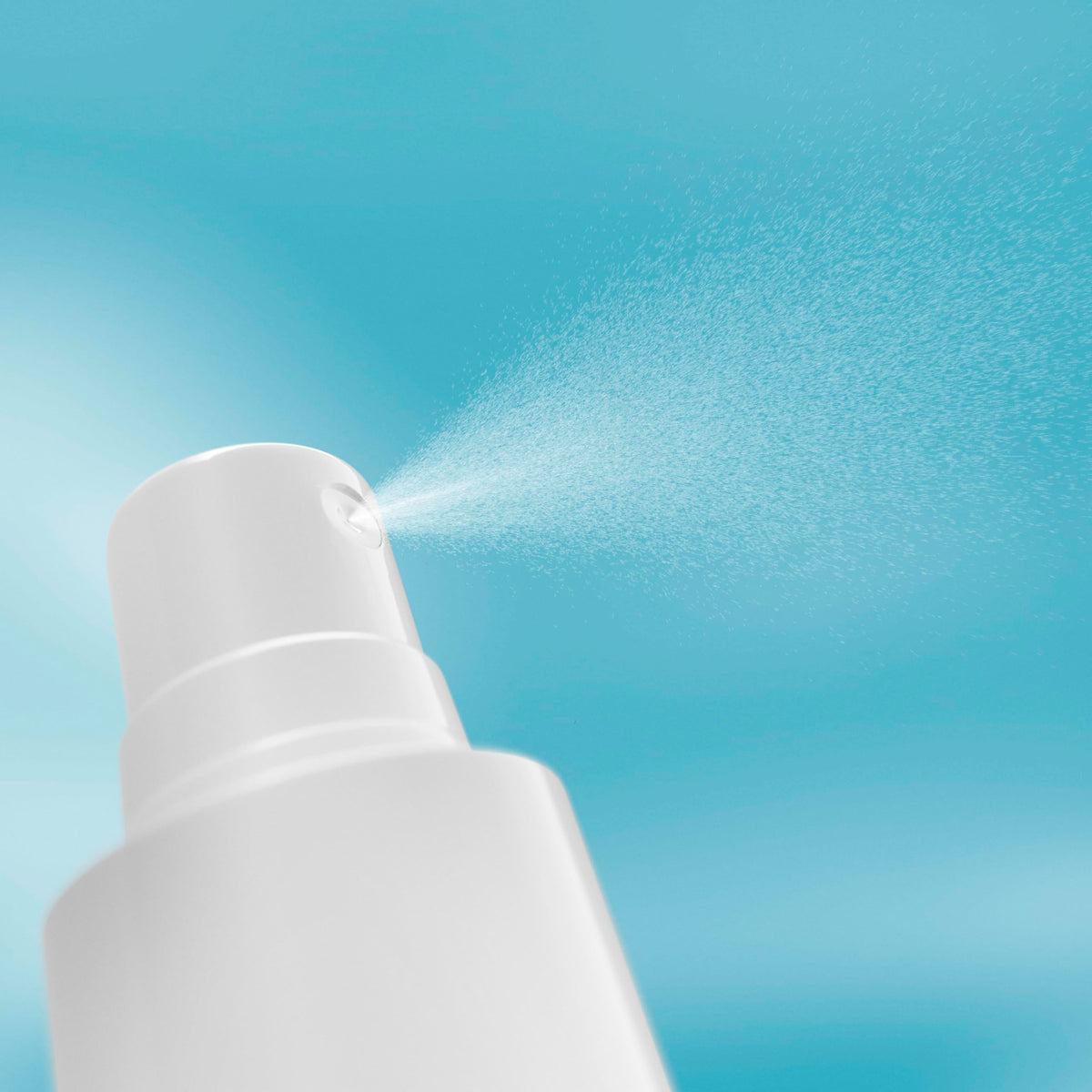 Neutrogena bottle held in hand for scale to show compact, travel-friendly size