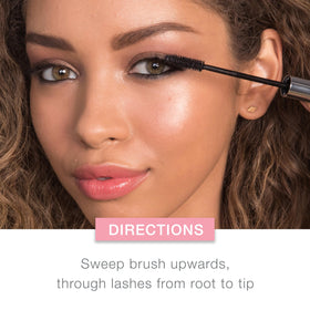 Neutrogena open tube with wand showing brush size and even coating benefit