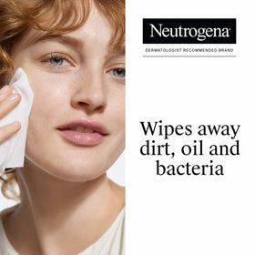 Neutrogena wipe pulled from open pack demonstrating easy single-hand access