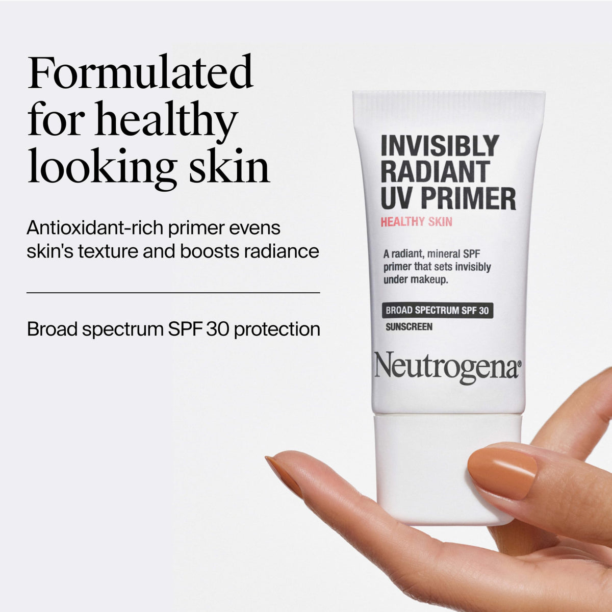 Neutrogena primer being blended with fingertips to demonstrate smooth application and priming benefit