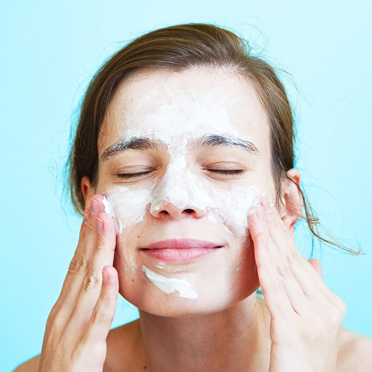 Neutrogena product dispensed on hand illustrating easy application