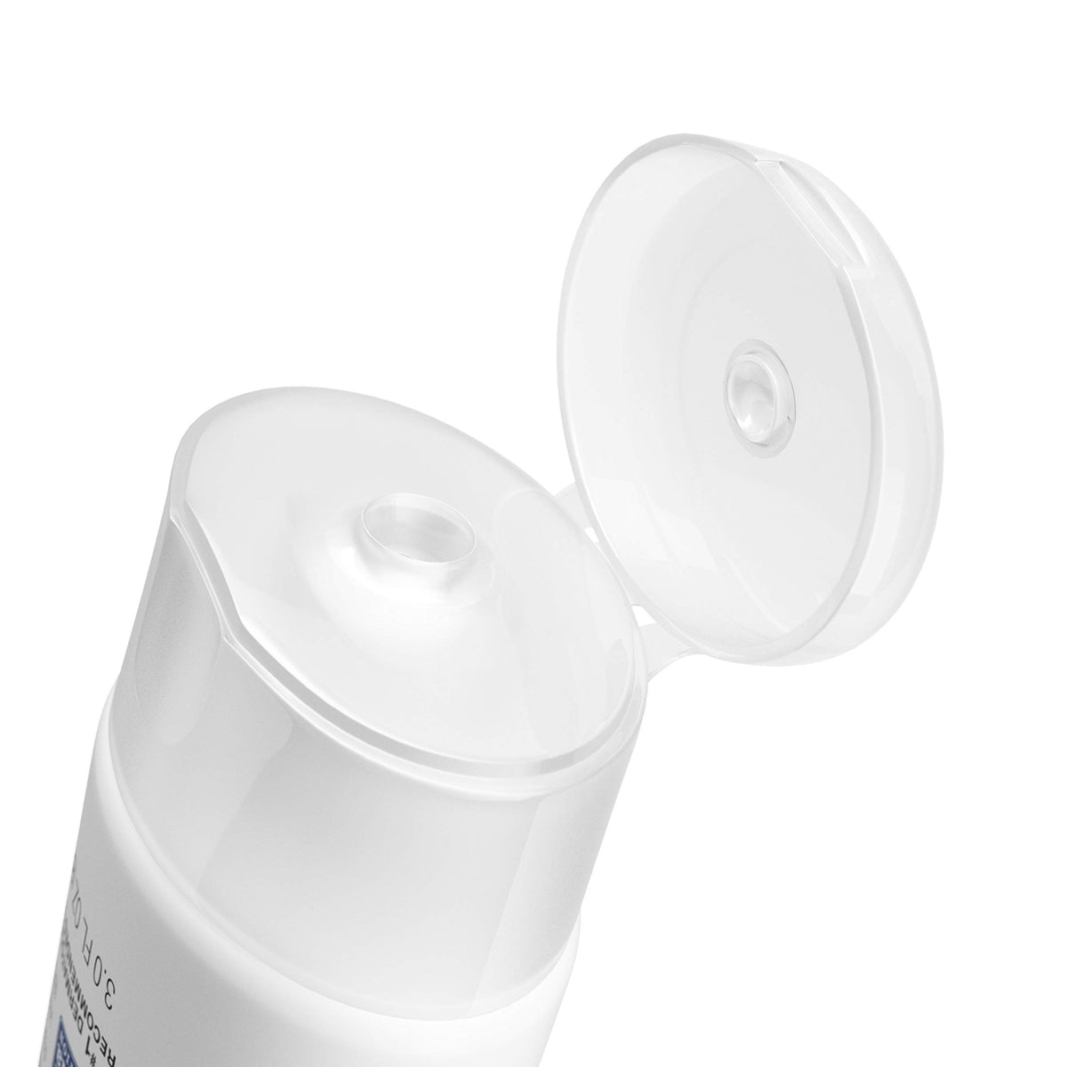 Neutrogena Pure & Free Baby next to a ruler showing compact 3 fl oz tube size