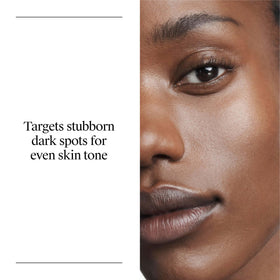 Neutrogena serum on hand demonstrating small pearl-sized amount for controlled dosing benefit