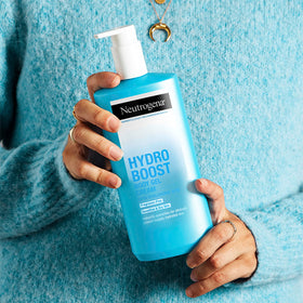 Neutrogena jar in hand to show scale and easy at-home use