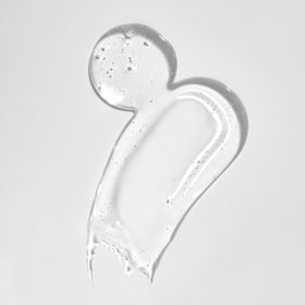 Neutrogena held in hand for scale showing compact, travel-friendly size