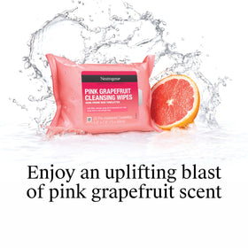 Neutrogena packets placed beside travel bag for on-the-go convenience