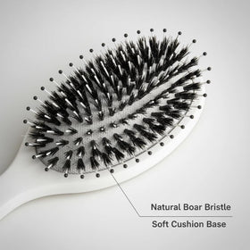 Nevecen brush in use on curly hair reducing frizz and detangling gently