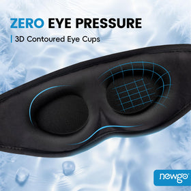 NEWGO worn by sleeper on pillows demonstrating restful blackout benefit