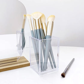 Newkita beside ruler illustrating 2.48x2.48x3.94-inch compact size