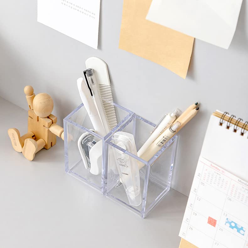 Newkita cups holding makeup brushes upright for quick access and protection
