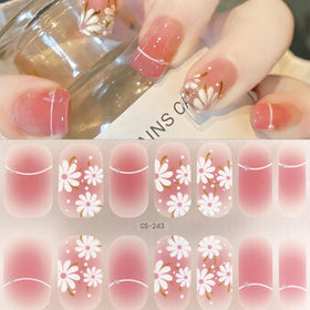 NEWSPIED completed cherry blossom nail design highlighting salon-style finish